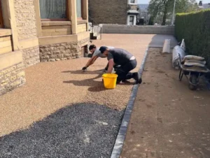 prepare a resin driveway base